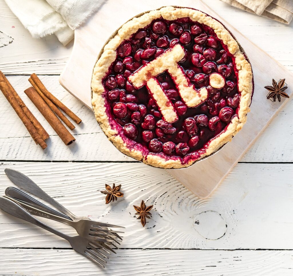 celebrating pi day with a cherry pie and the greek symbol for pi