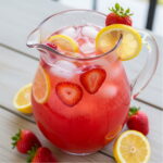 pitcher of Sparkling Strawberry Lemonade Punch